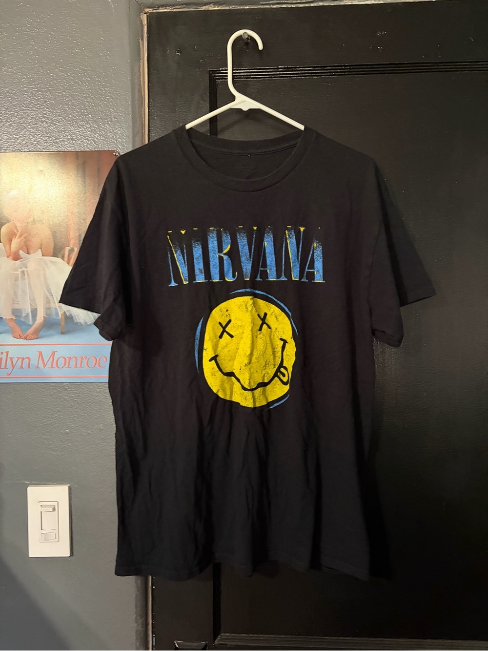 Nirvana Black Graphic Tee with Yellow Smile Logo
